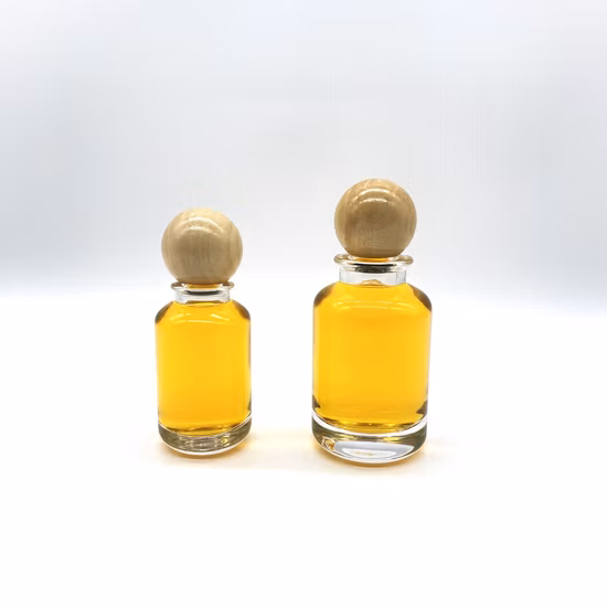 Venda quente 50ml 100ml frasco de perfume de vidro cilíndrico com tampa redonda de madeira